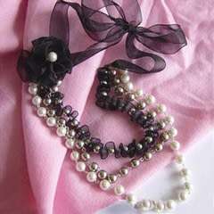 Make A Ribbon And Pearl Necklace Well Paired With Your Sweater