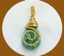 Capped And Wrapped Teardrop Turquoise Pendant