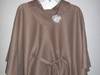 Small_full_nosewponcho1_1322332482