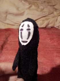 No Face Doll