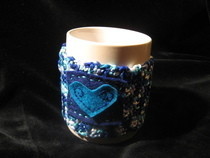 Crocheted Squirly Heart Mug Cosy