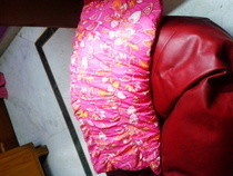 One Dress = Floor Pillow + Toilet Paper Holder