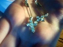 Safety Pin Earrings With Cross Charms.