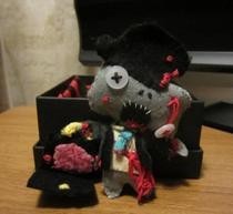 Felt And Needle Work Zombie Banker.