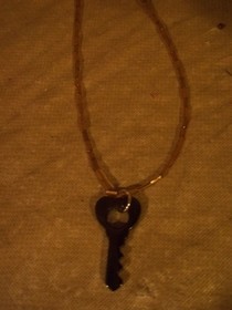 Gold And Black Key Necklace