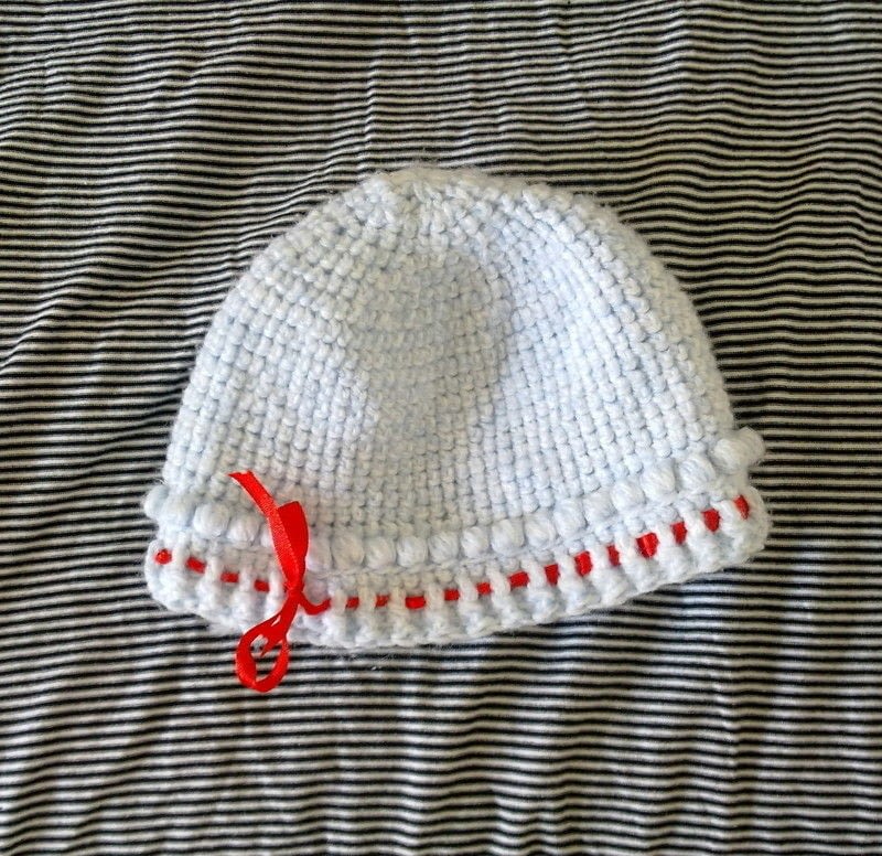 Baby Cap · A Baby Hat · Knitting on Cut Out + Keep · Creation by Monica a.