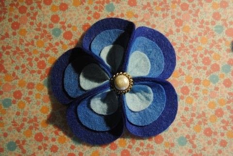 Felt Flower .  Free tutorial with pictures on how to sew a fabric flower brooches in under 60 minutes by decorating, jewelrymaking, sewing, and felting with felt, thread, and cardboard. Inspired by vintage & retro, flowers, and clothes & accessories. How To posted by Saskia F. Difficulty: Easy. Cost: Absolutley free. Steps: 10