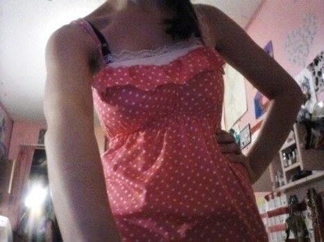 A cute pink polka dot tank top with a ruffle on the top. .  Make a ruffled top in under 60 minutes by braiding and sewing with sewing machine, elastic, and jersey fabric. Creation posted by Rachel's Craft Channel. Difficulty: Simple. Cost: No cost.