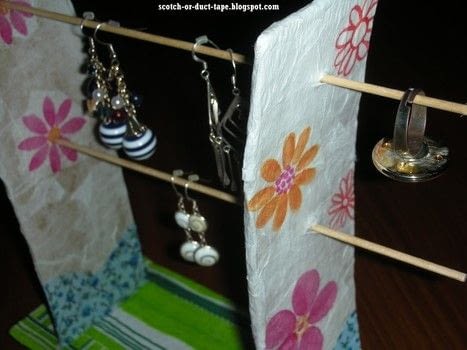 A simple design that needs no efford .  Free tutorial with pictures on how to make an earring hanger in under 20 minutes by decorating with glue, cardboard, and napkins. Inspired by christmas and flowers. How To posted by TesaJanuska. Difficulty: Simple. Cost: No cost. Steps: 1