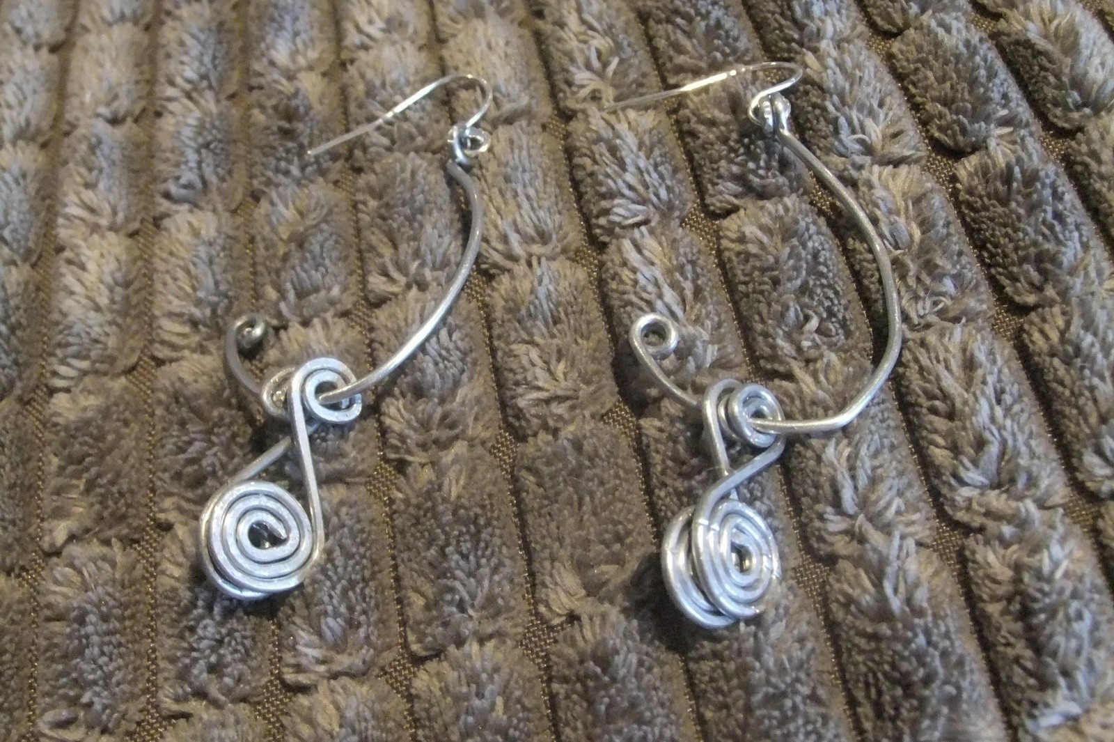 Coil Earrings · How To Make A Pair Of Wire Earrings · Jewelry on Cut Out + Keep