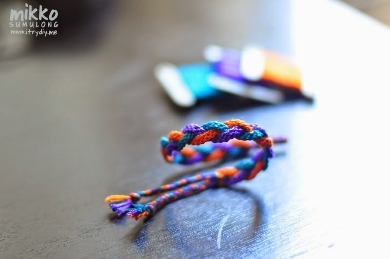 Colorful Braided Friendship Bracelets Handmade of Thread on Stand for Sale  Isolated on Beige Background with Copy Space Stock Photo  Image of  children copy 173072412