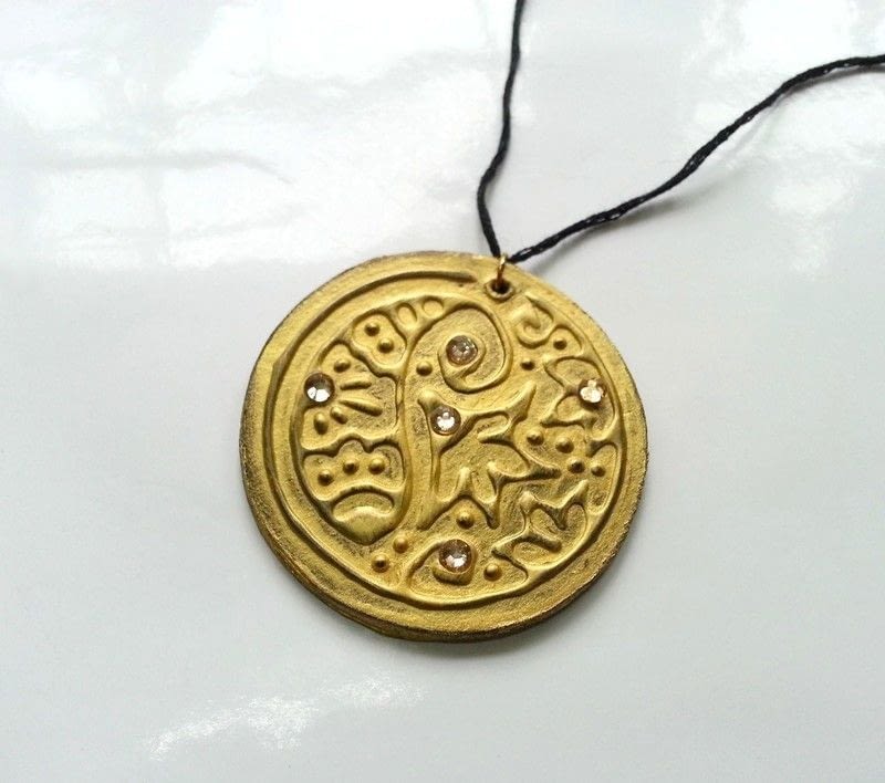 DIY Embossed Pendants · How To Make A Paper Necklace · Jewelry on Cut