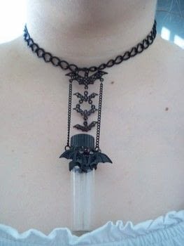 Sweet like chocolate! .  Make a vial in under 180 minutes by jewelrymaking with glue, wire, and chain. Inspired by bats. Creation posted by Lyssa C. Difficulty: Easy. Cost: 3/5.