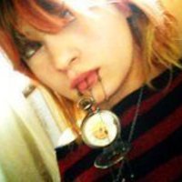 Rhia R.